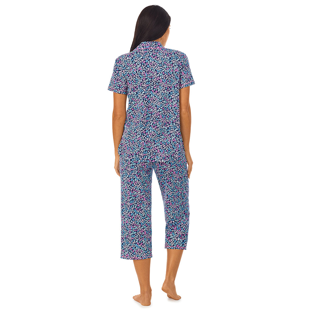 Multi Animal; Model is wearing size S. She is 5'8.5", Bust 32", Waist 25", Hips 36".@A lady wearing short sleeve notch collar pajama set with multi animal print