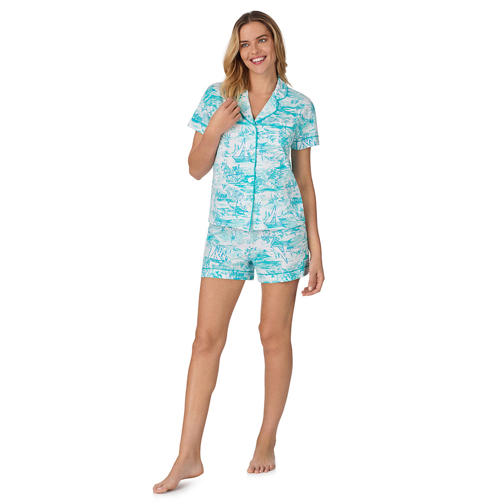 Summer Scene; Model is wearing size S. She is 5’10”, Bust 34”, Waist 26", Hips 38”.@A lady wearing blue Short Sleeve Notch Collar with Boxer Short pajama set with summer scene print