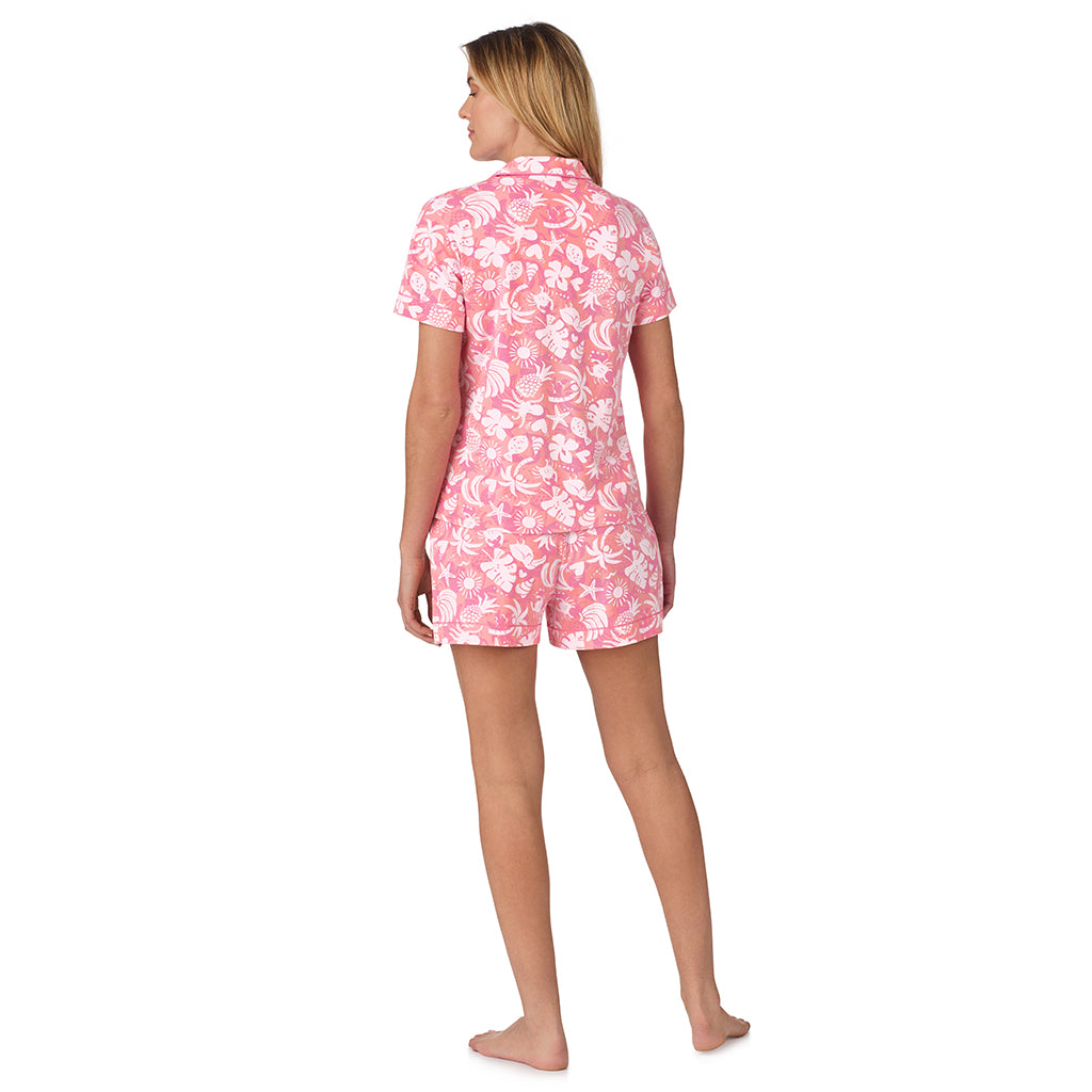 Coral Tropical;Model is wearing size S. She is 5’10”, Bust 34”, Waist 26", Hips 38”.@A lady wearing pink Short Sleeve Notch Collar with Boxer Short pajama set with coral tropical print