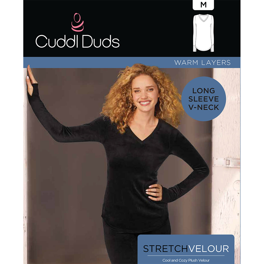 A lady wearing black stretch velour long sleeve v-neck