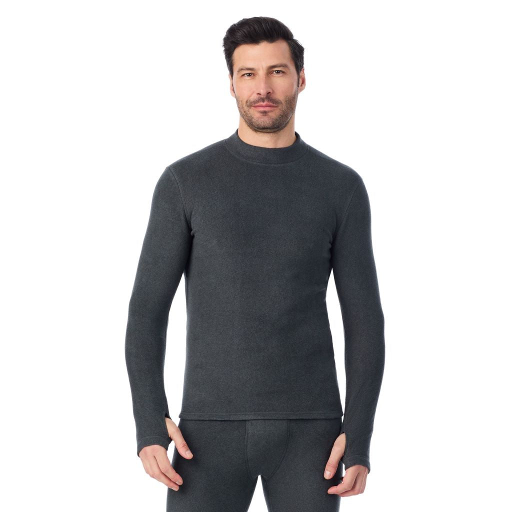 Black Heather; Model is wearing a size M. He is 6’2”, Waist is 32”, Inseam 34”@A man wearing Black Heather Fleecewear Long Sleeve Mock Neck
