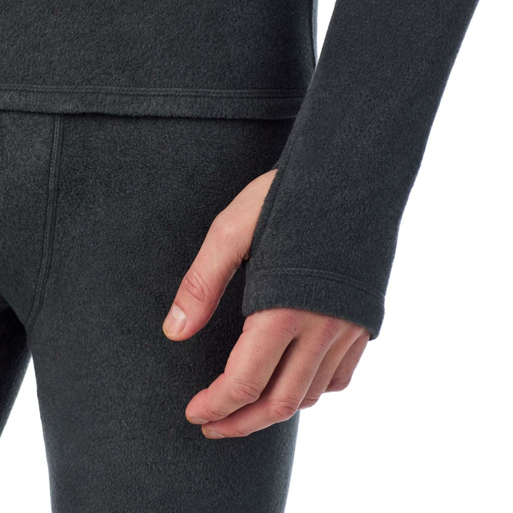 Black Heather; Model is wearing a size M. He is 6’2”, Waist is 32”, Inseam 34”@A man wearing Black Heather Fleecewear Long Sleeve Mock Neck
