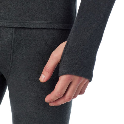 Black Heather; Model is wearing a size M. He is 6’2”, Waist is 32”, Inseam 34”@A man wearing Black Heather Fleecewear Long Sleeve Mock Neck
