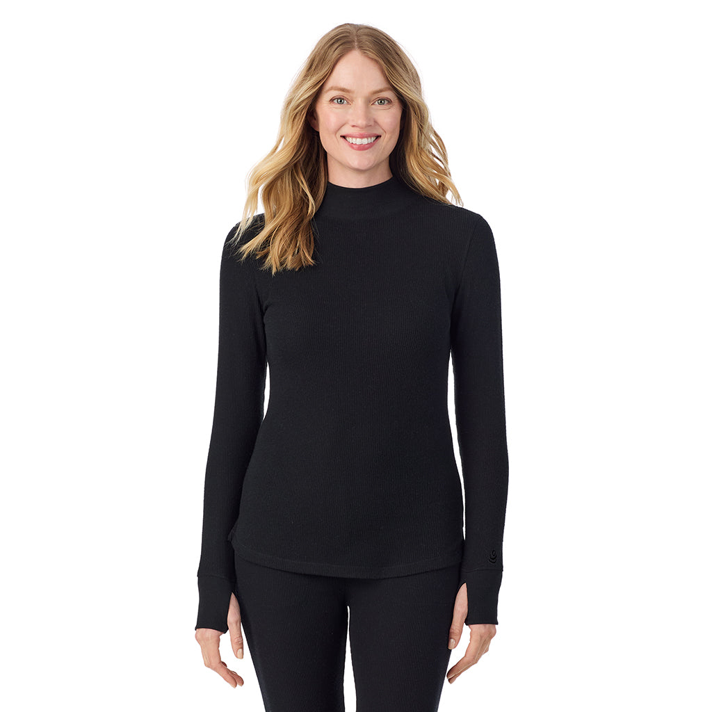A lady wearing Cozy Stretch Thermal Long Sleeve Mock Neck in Black  
