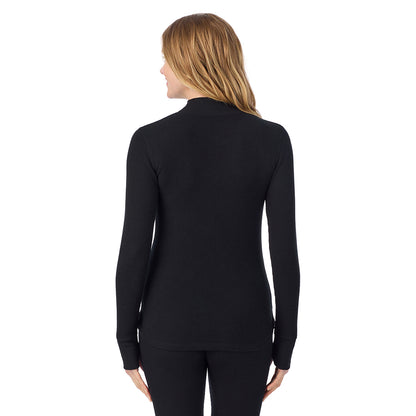 Black; Model is wearing size S. She is 5'11", Bust 33", Waist 24", Hips 34".@ A lady is wearing a black Cozy Stretch Thermal Long Sleeve Mock Neck
