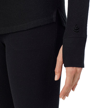 Black; Model is wearing size S. She is 5'11", Bust 33", Waist 24", Hips 34".@ A lady is wearing a black Cozy Stretch Thermal Long Sleeve Mock Neck
