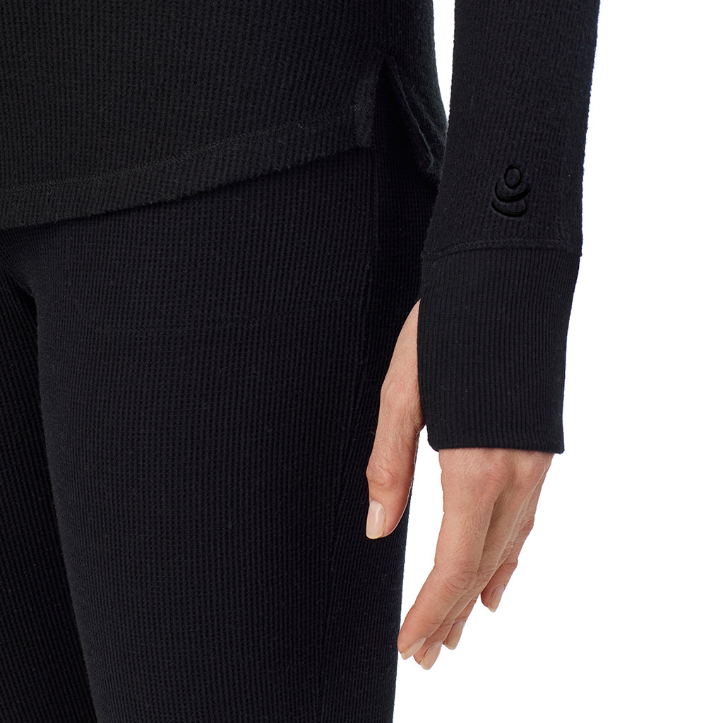 A lady wearing Cozy Stretch Thermal Long Sleeve Mock Neck in Black close up close up