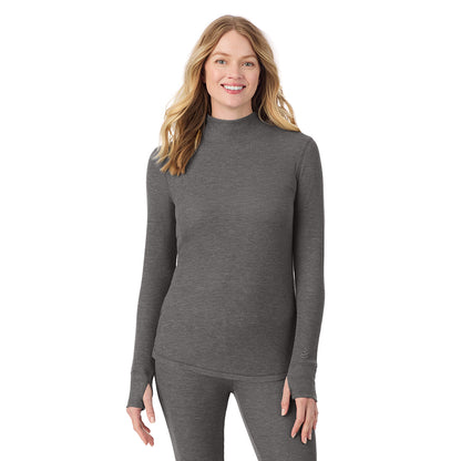 Stone Grey Heather; Model is wearing size S. She is 5'11", Bust 33", Waist 24", Hips 34".@ A lady is wearing a stone grey heather Cozy Stretch Thermal Long Sleeve Mock Neck