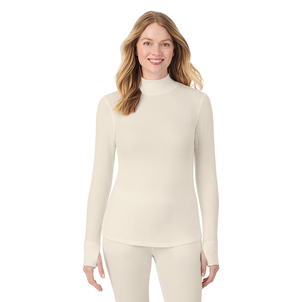  A lady is wearing a ivory Cozy Stretch Thermal Long Sleeve Mock Neck