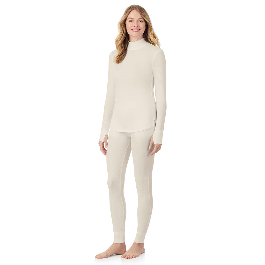  A lady is wearing a ivory Cozy Stretch Thermal Long Sleeve Mock Neck