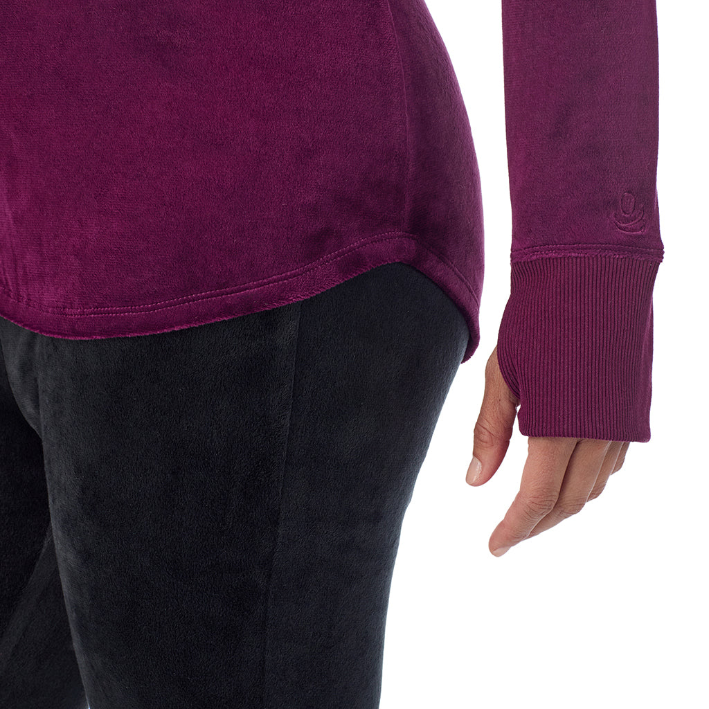 A lady wearing Stretch Velour Long Sleeve V-Neck
