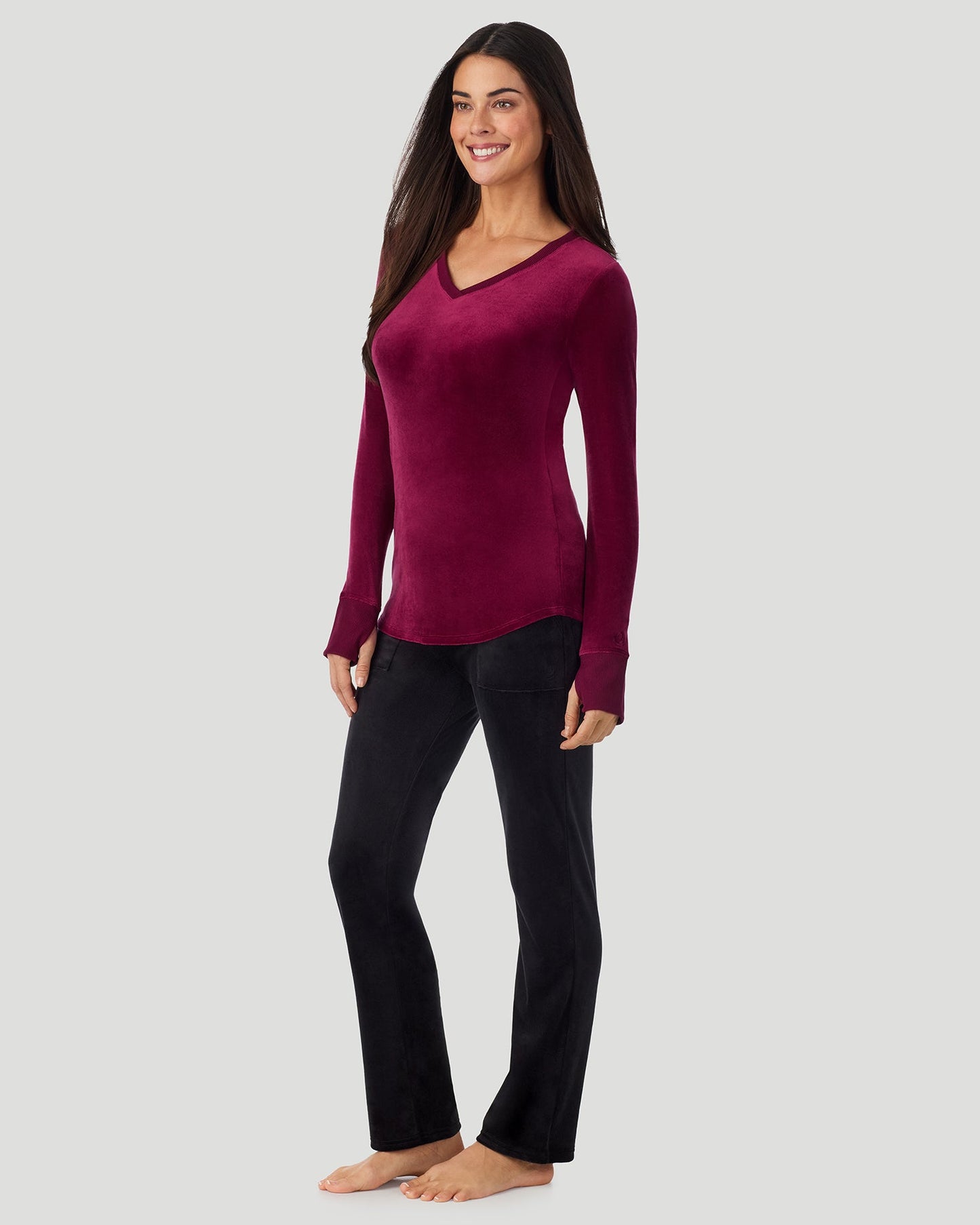 Bordeaux; Model is wearing a size S. She is 5’9”, Bust 34.5”, Waist 25”, Hips 36.5”. @A lady wearing Stretch Velour Long Sleeve V-Neck in bordeaux shown in a front view standing pose