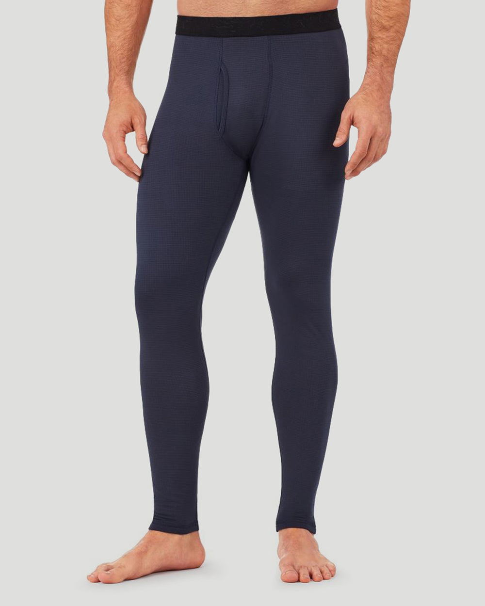 A man wearing a asphalt grey X fleece pant.