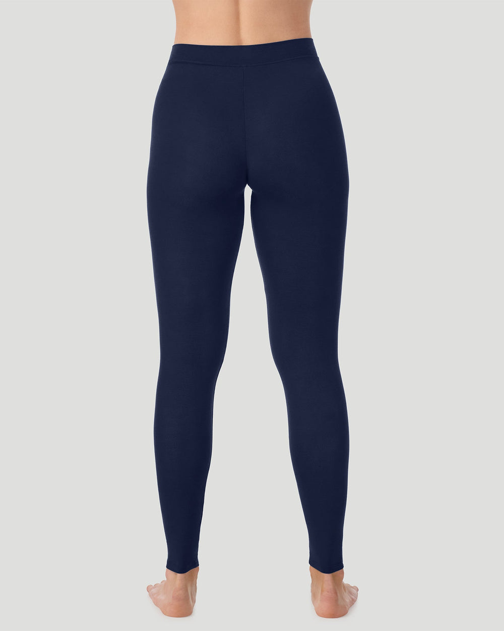 A lady wearing Softwear With Stretch Long Sleeve V-Neck PLUS in Navy Blazer back view back view