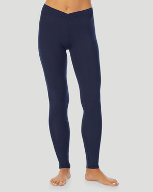 upper body of a lady wearing black long sleeve v-neck top