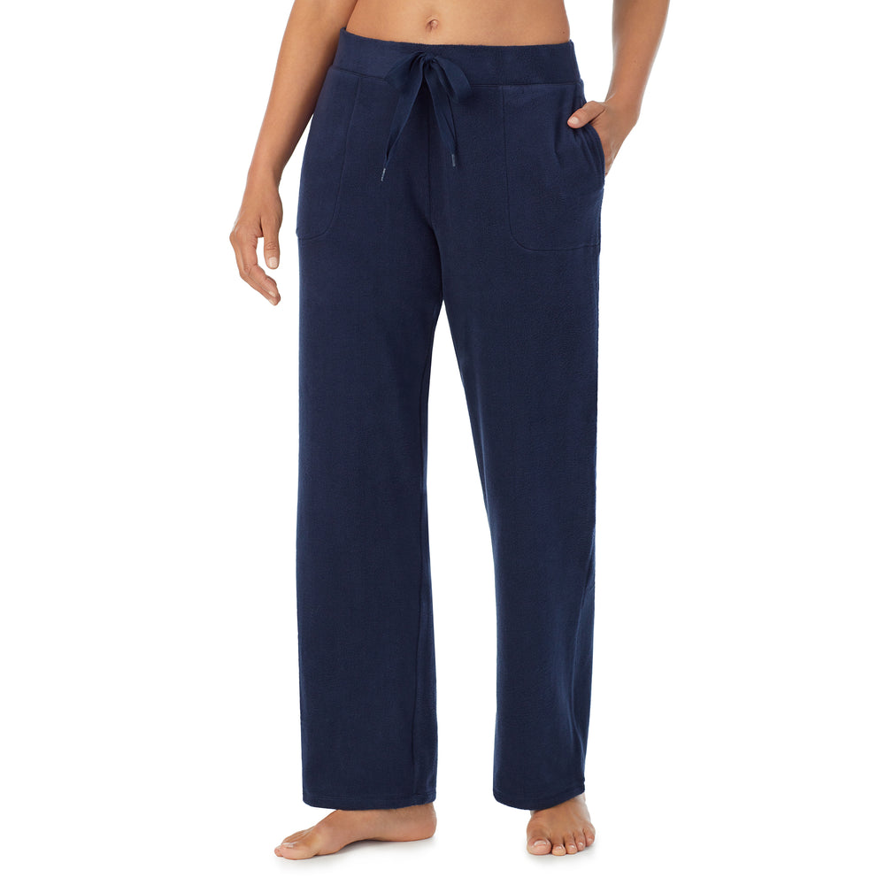 A lady wearing Fleecewear With Stretch Lounge Pant in Navy Blazer side view side view