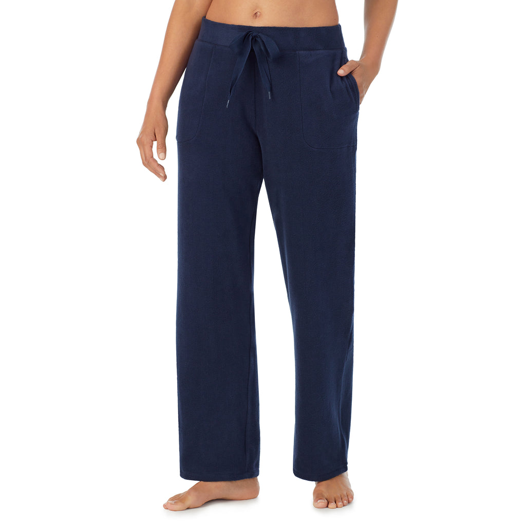 A lady wearing Fleecewear With Stretch Lounge Pant in Navy Blazer side view side view