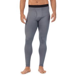 A man wearing nickel grey arcticore pant.