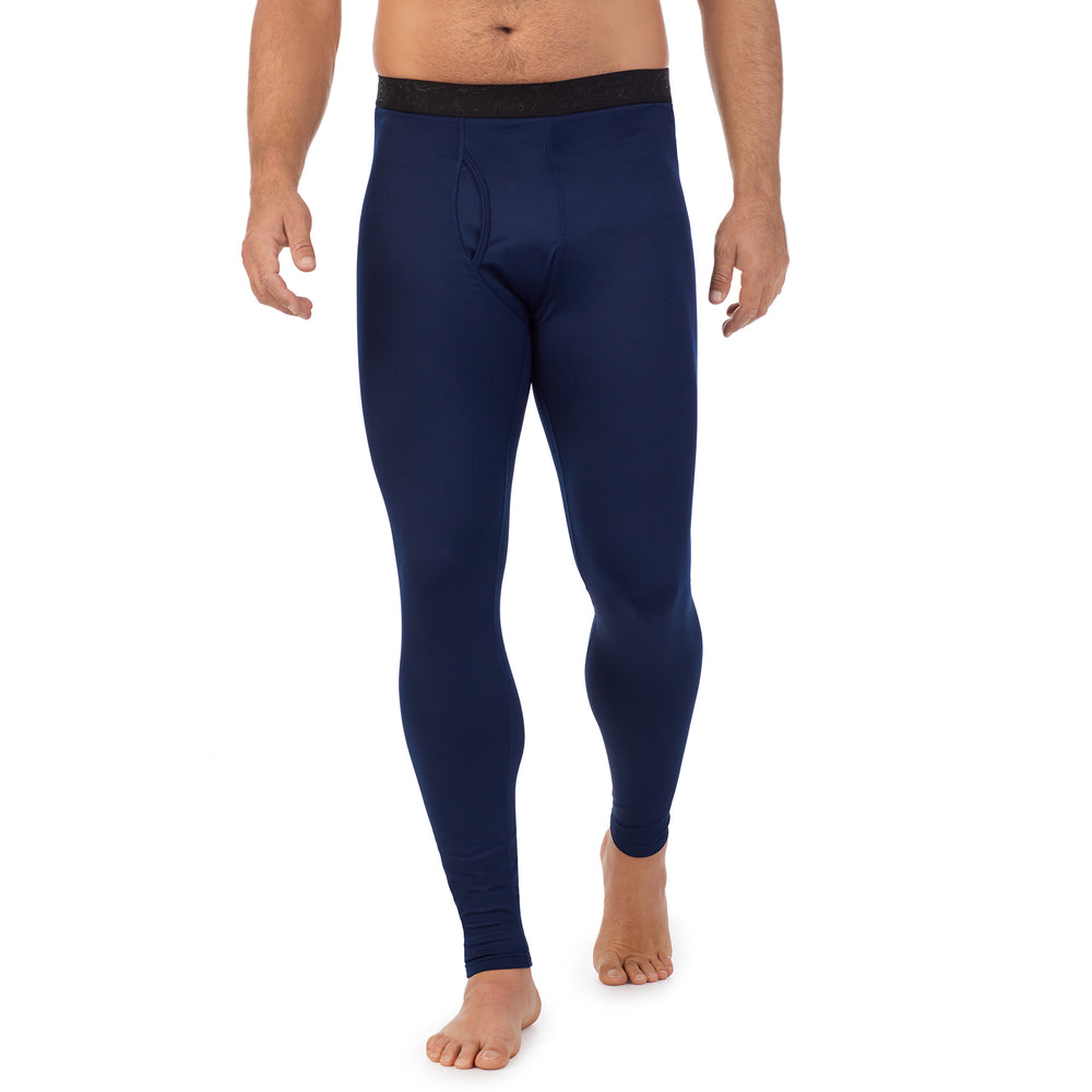 A man wearing navy blazer arcticore pant.