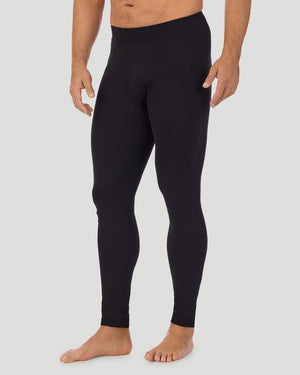 A man wearing a black cottonwear pant