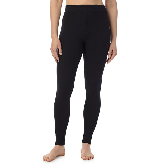 A lady is wearing a Black Stretch Rib Legging