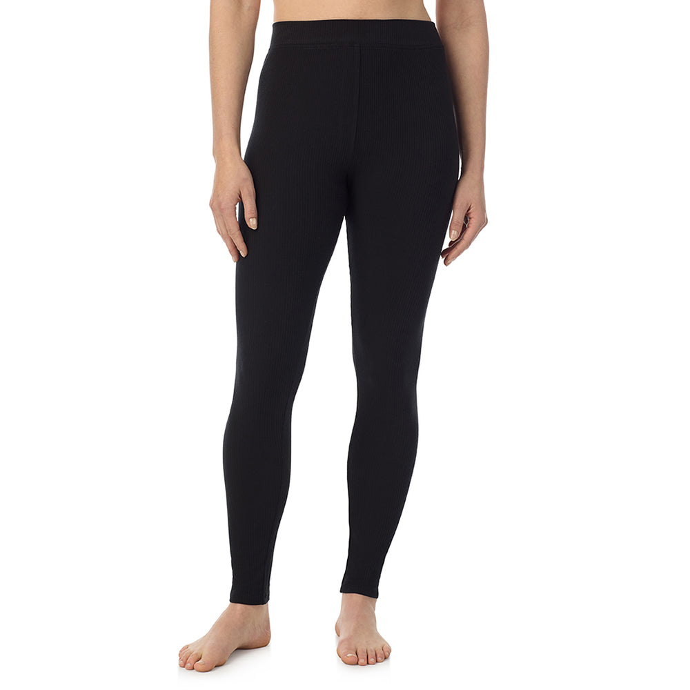 A lady is wearing a Black Stretch Rib Legging