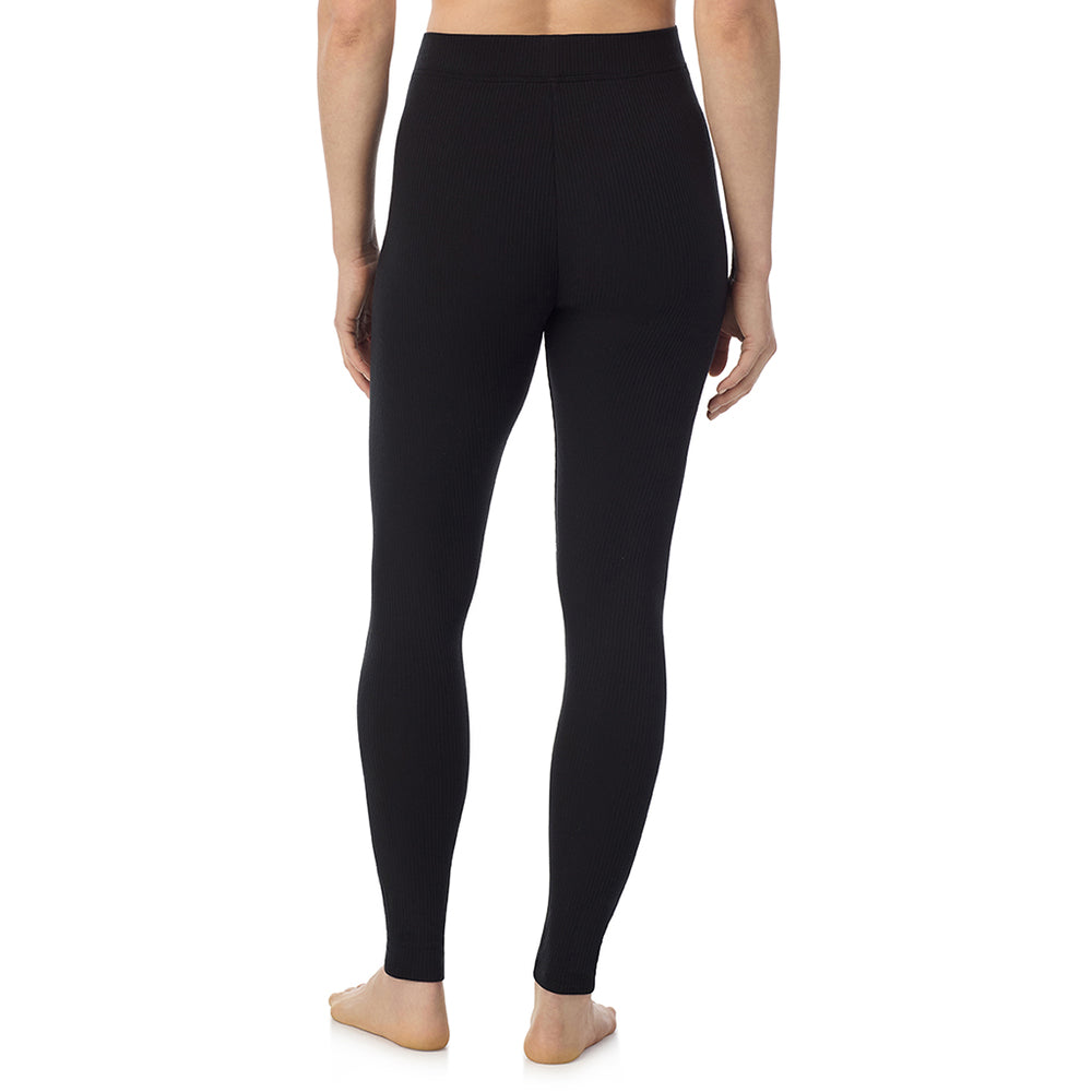 A lady is wearing a Black Stretch Rib Legging