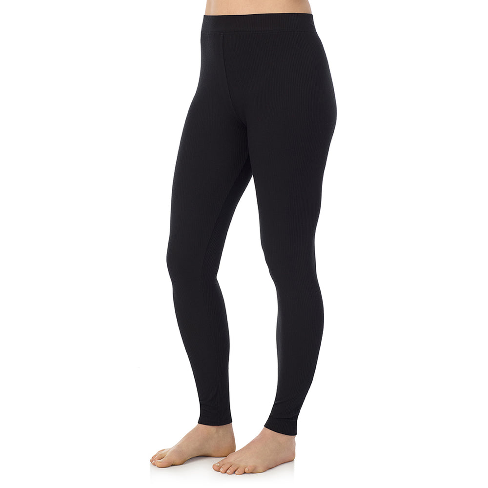 A lady is wearing a Black Stretch Rib Legging