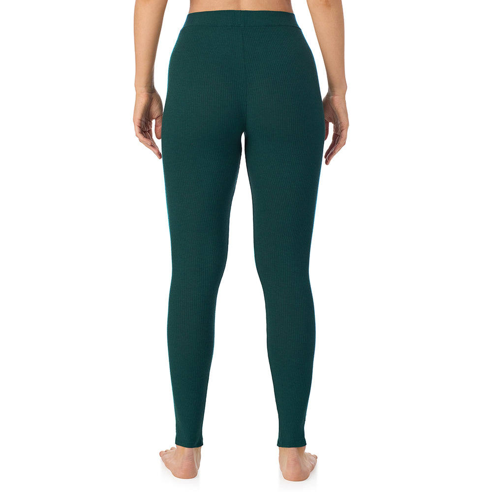 A lady is wearing a Dark Pine Stretch Rib Legging