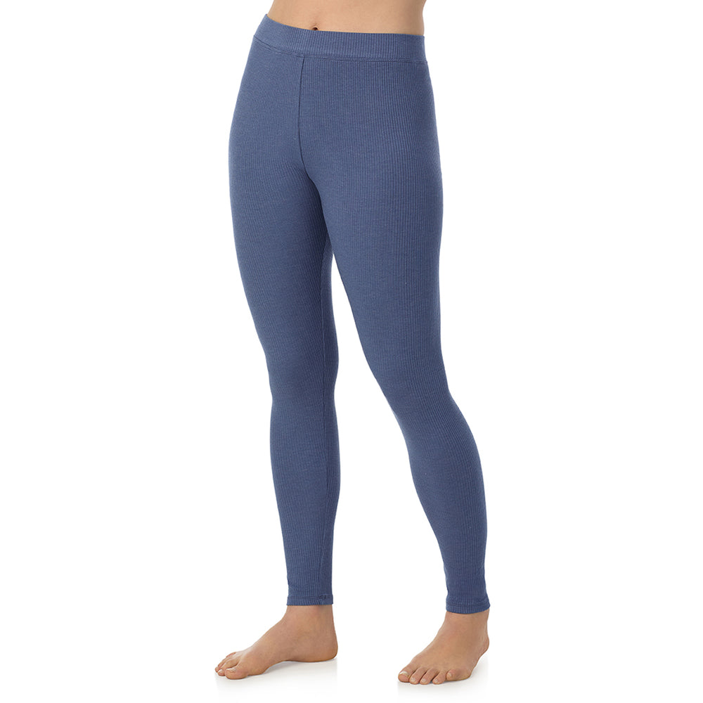 A lady is wearing a Smoke Blue Heather Stretch Rib Legging