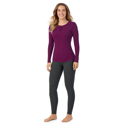 Dark Purple; Model is wearing size S. She is 5'11.5", Bust 34", Waist 26", Hips 37".@ A lady is wearing a Dark Purple Stretch Rib Long Sleeve Henley