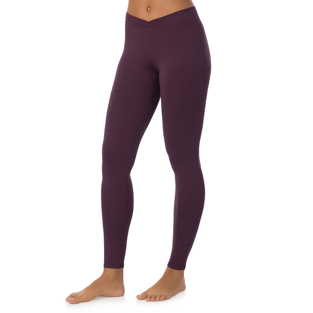 Boysenberry; Model is wearing size S. She is 5’9”, Bust 34”, Waist 23”, Hips 35”. @A lady wearing a boysenberry stretch legging.