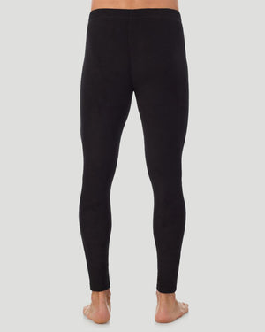 A man wearing black fleecewear pant.