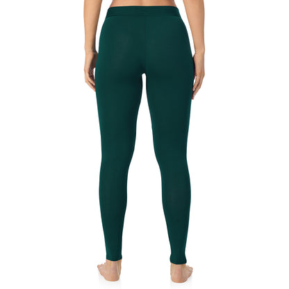 Dark Pine; Model is wearing size S. She is 5'11.5", Bust 34", Waist 26", Hips 37". @A lady wearing a dark pine stretch legging tall.
