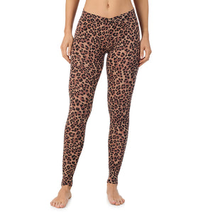 A lady wearing a taupe leopard stretch legging.