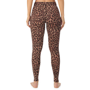 A lady wearing a taupe leopard stretch legging.