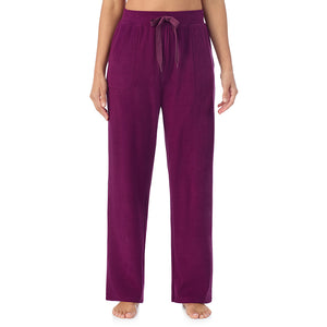 A lady wearing Dark Purple fleecewear with stretch lounge pant.!94% Recycled Polyester, 6% Spandex!