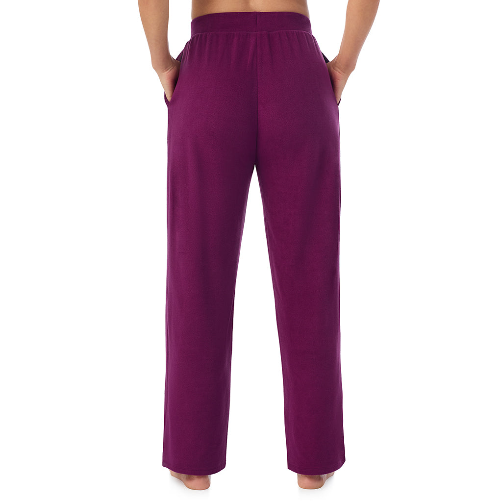 A lady wearing Dark Purple fleecewear with stretch lounge pant.!94% Recycled Polyester, 6% Spandex!