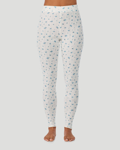 A lady is wearing Blue Ditsy Cotton Pointelle Legging in a front view look