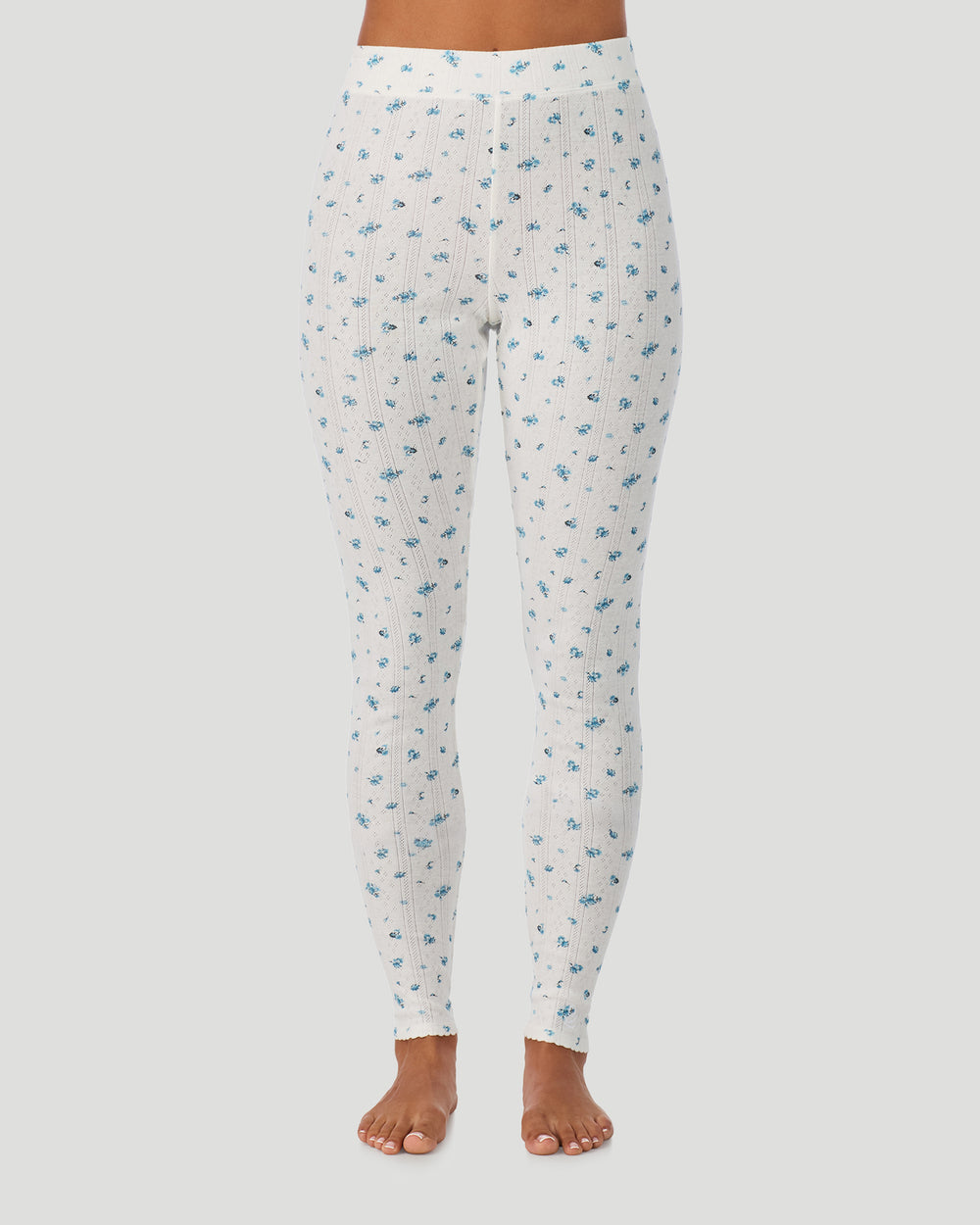 A lady is wearing Blue Ditsy Cotton Pointelle Legging in a front view look