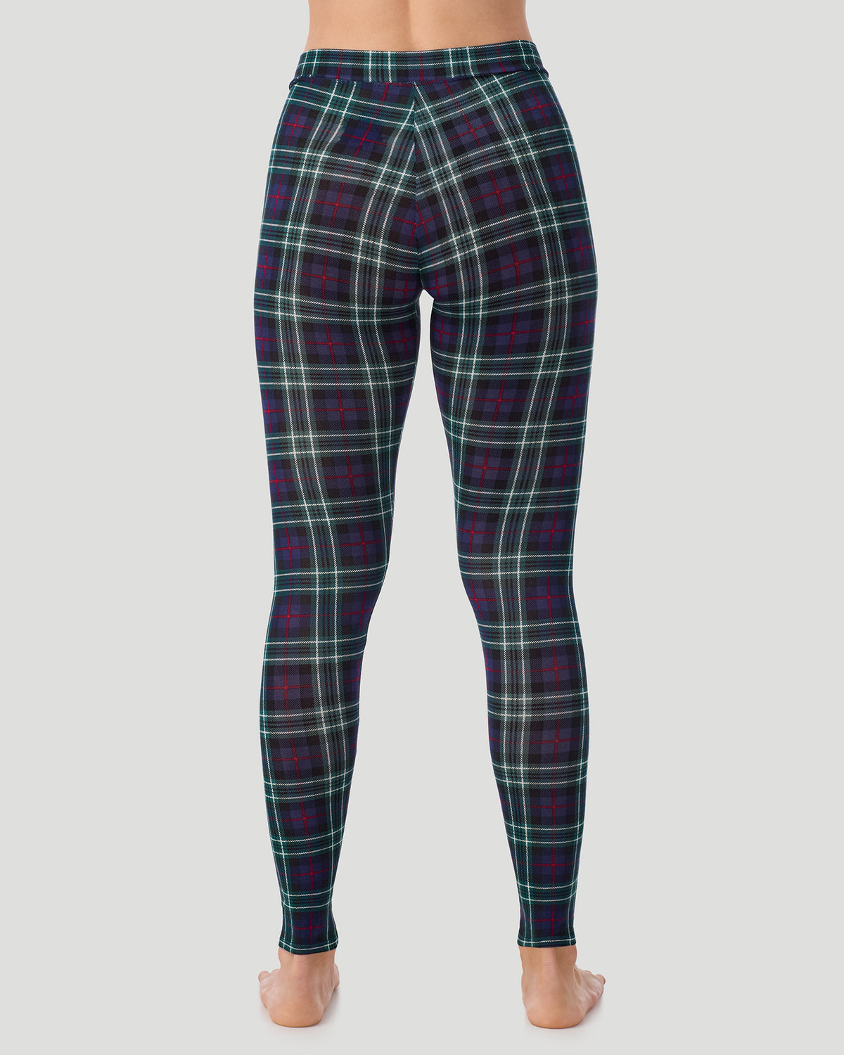  A lady wearing a Blackwatch Plaid Softwear With Stretch Legging in a back view pose