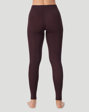  A lady wearing a Mahogany Softwear With Stretch Legging in a back view pose