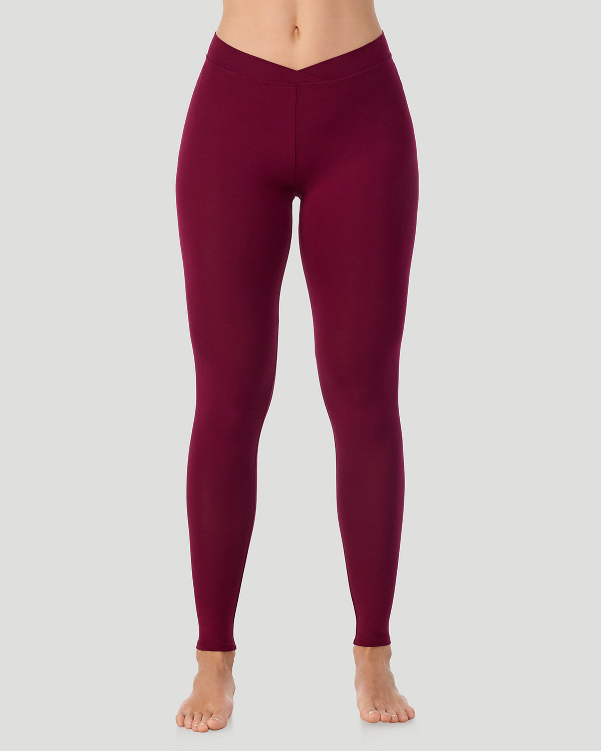 Bordeaux; Model is wearing a size S. She is 5’11.5”, Bust 34”, Waist 27”, Hips 38.5”.  @ A lady wearing a Bordeaux Softwear With Stretch Legging in a front view pose