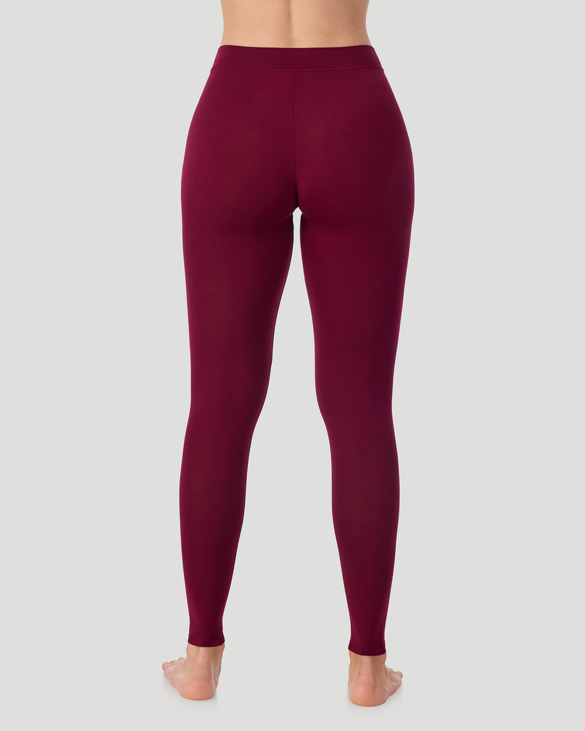  A lady wearing a Bordeaux Softwear With Stretch Legging in a back view pose