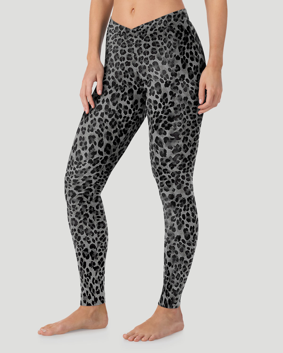  A lady wearing a Charcoal Leopard Softwear With Stretch Legging in a front view side angle pose