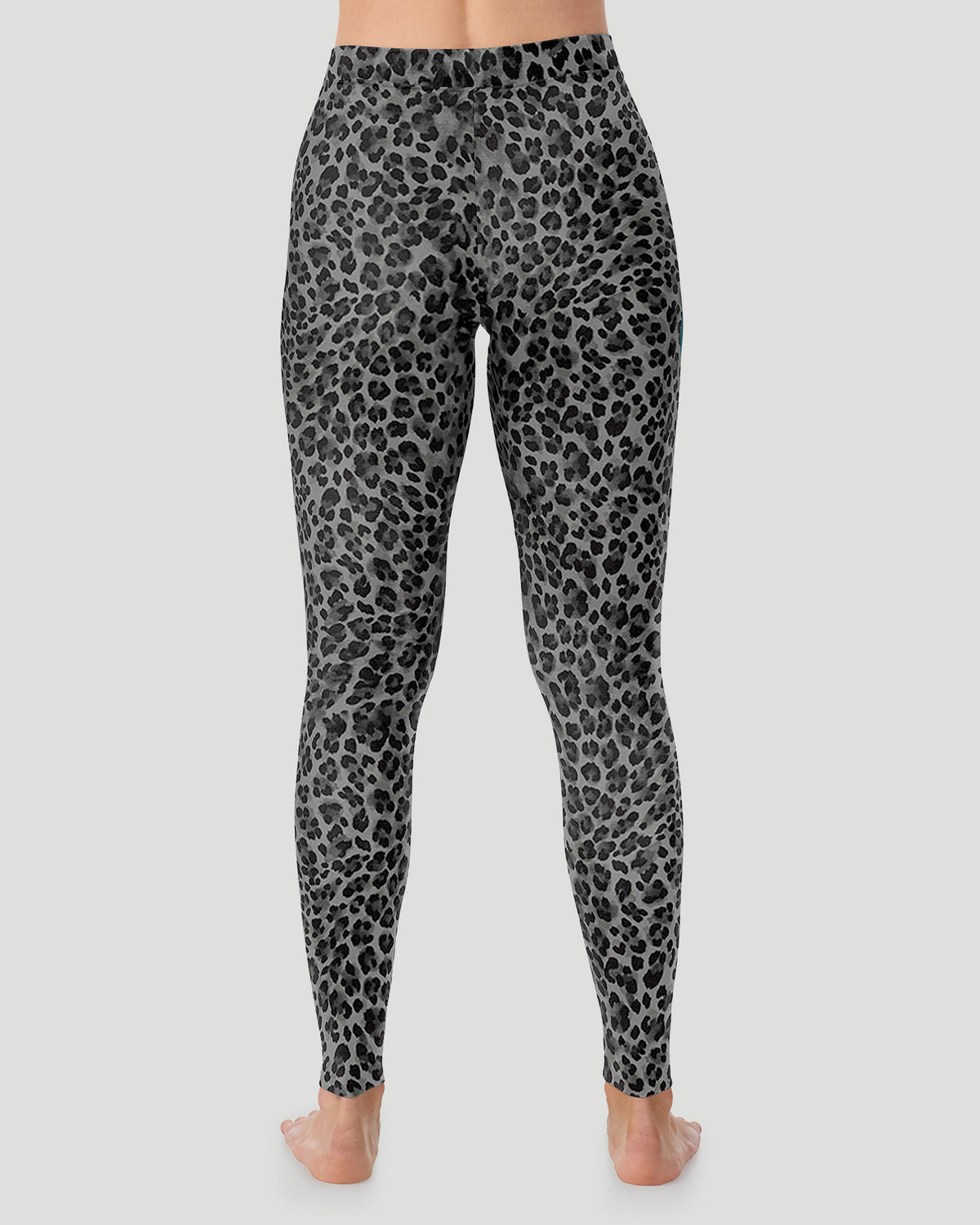  A lady wearing a Charcoal Leopard Softwear With Stretch Legging in a back view pose