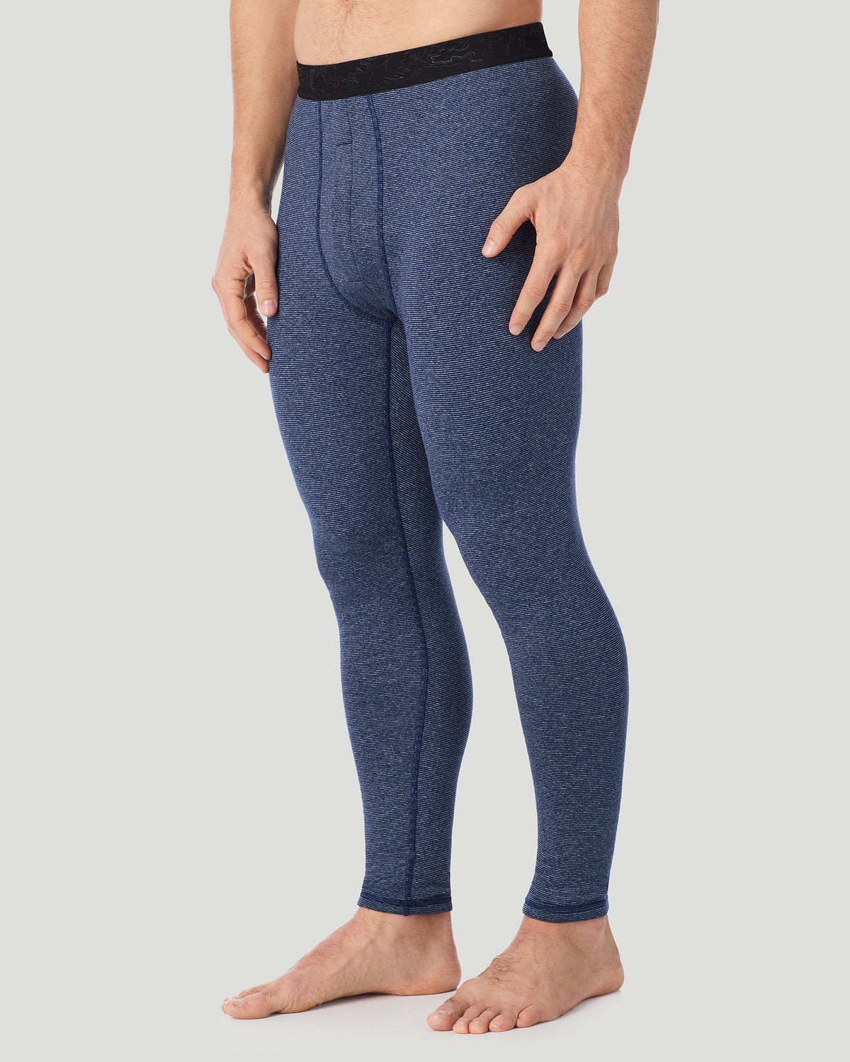  A man wearing Navy Stripe FlexStripe Pant in a side view pose