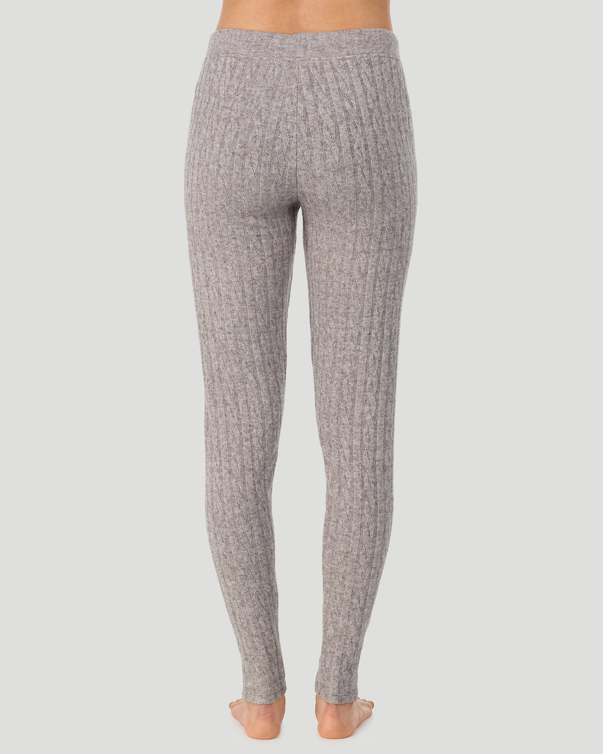 Light Grey Heather; Model is wearing a size S. She is 5’10”, Bust 33.5”, Waist 25”, Hips 36”. @A lady wearing Light Grey Heather Cable Knit Legging in a back view pose