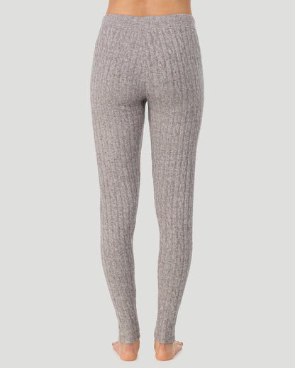 A lady wearing Light Grey Heather Cable Knit Legging in a back view pose