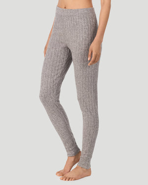 A lady wearing Light Grey Heather Cable Knit Legging in a front view side angle pose